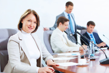 Fototapeta premium Four businesspeople at meeting