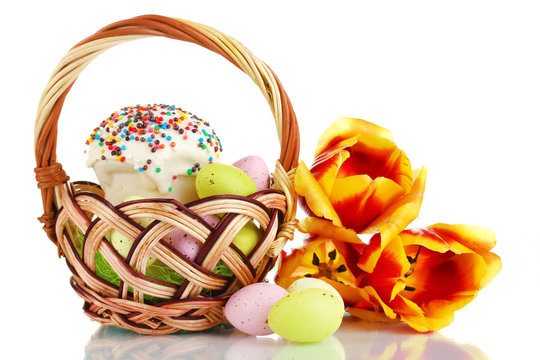 Easter cake with eggs in wicker basket isolated on white