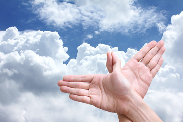 bird hand signal and cloudy blue sky