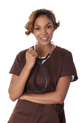 Female nurse in scrubs holds a stethoscope.