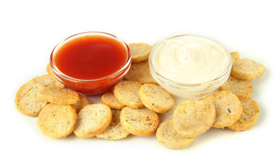 Crackers  and sauces, isolated on white