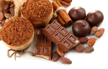 Composition of chocolate sweets, cocoa and spices, isolated