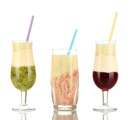 Delicious fruit smoothies isolated on white