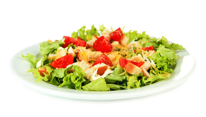 Caesar salad on white plate, isolated on white