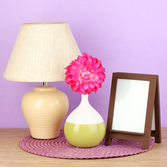 Brown photo frame and lamp