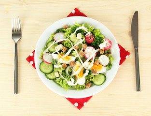 Fresh mixed salad with eggs, salad leaves and other vegetables,