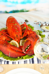 Red lobster on platter on serving table close-up