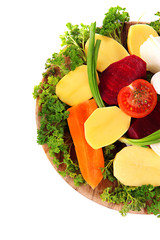 Many peeled vegetables  isolated on white