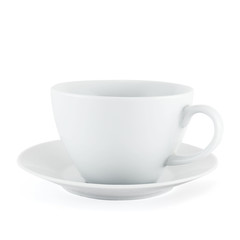 Empty ceramic tea cup over white plate