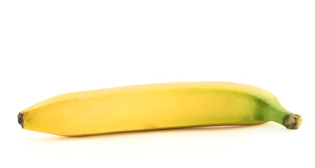 Fototapeta na wymiar Single yellow spotless banana over white