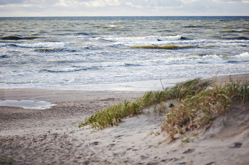 sunset by the sea with dunes