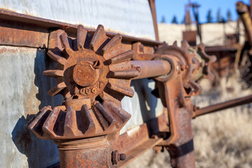 Rusty grear closeup on an old combine