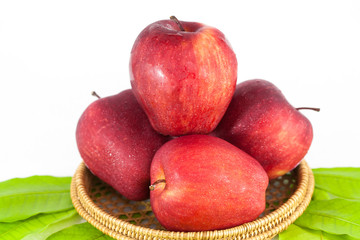 A juicy red apple on a white background