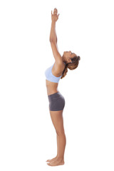 Young woman shows proper Yoga technique.