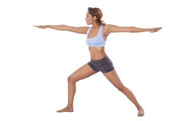 Fototapeta na wymiar Latin woman performs Yoga moves.