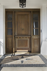 Wooden front door of an upscale home