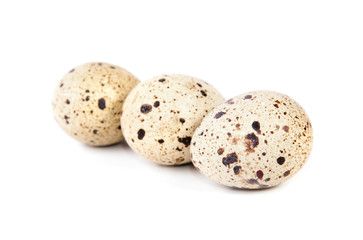 Obraz premium quail eggs isolated on white background