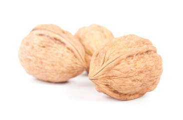 three walnuts isolated on white