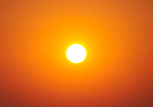 Bright big sun on sky with yellow orange gradient colors