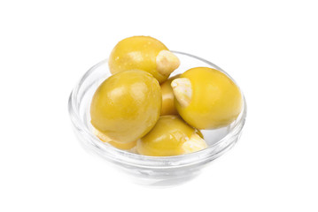 Green olives stuffed with almonds  on glass bowl