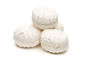 Marshmallows over white background