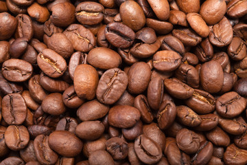 Naklejka premium coffee beans close up isolated on white