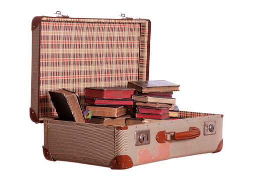 old suitcase stuffed with old books