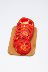Sliced red pepper isolated on white background