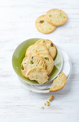 Butter cookies with pistachios on a plate