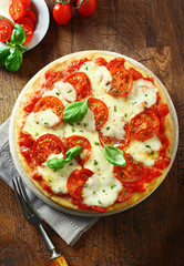 Freshly baked tomato and cheese pizza