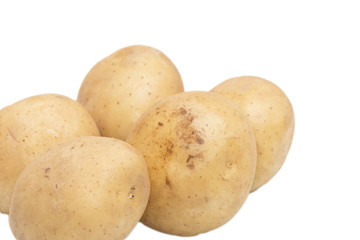 Fresh potatoes on a white background