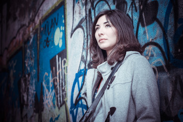 Fototapeta premium Beautiful stylish woman listening to music