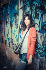 Naklejka premium Beautiful stylish woman listening to music