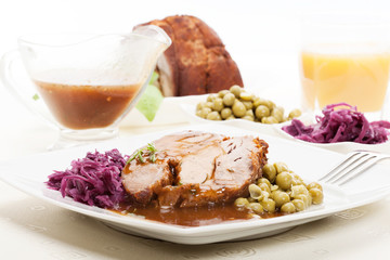 Roast pork with sauce. Selective focus.