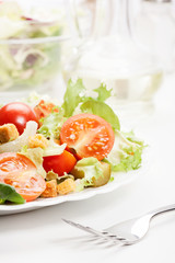 Close-up of salad. Lettuce, tomato, cucumber. Selective focus