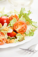 Close-up of salad. Lettuce, tomato, cucumber. Selective focus