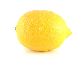 Isolated yellow lemon with water drops.