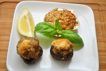 Appetizers of Stuffed Mushrooms and a Stuffed Scallop Shell