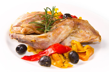 Baked rabbit with olives and pepper
