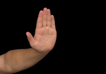 hand on a black background