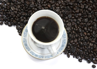 A cup of coffee and coffee beans background