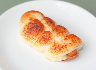 Bread bun with sausage stuffed.