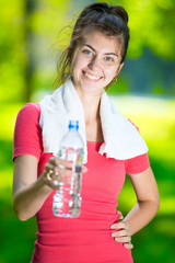 Young woman drinking water