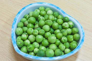 Pea eggplants in a cup