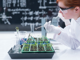 student analyzing in a chemistry lab
