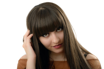 Naklejka premium a beautiful woman with long hair in studio isolated on white bac