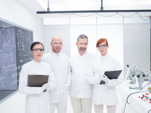 researchers team in a chemistry lab