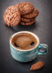 Cup of coffee and chocolate cookies with chocolate chips
