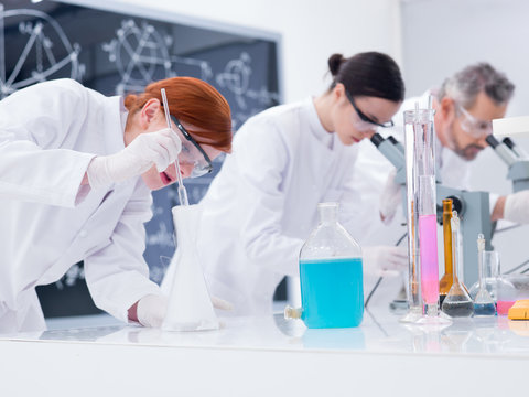 scientists conducting lab experiments