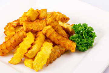 fried sliced ​​curly sticks potatoes